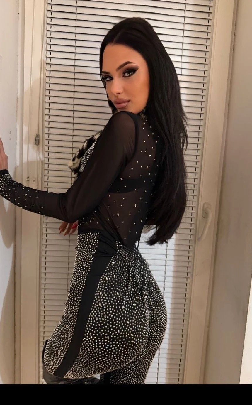 Lana Bajc in a crystal-embellished black dress.