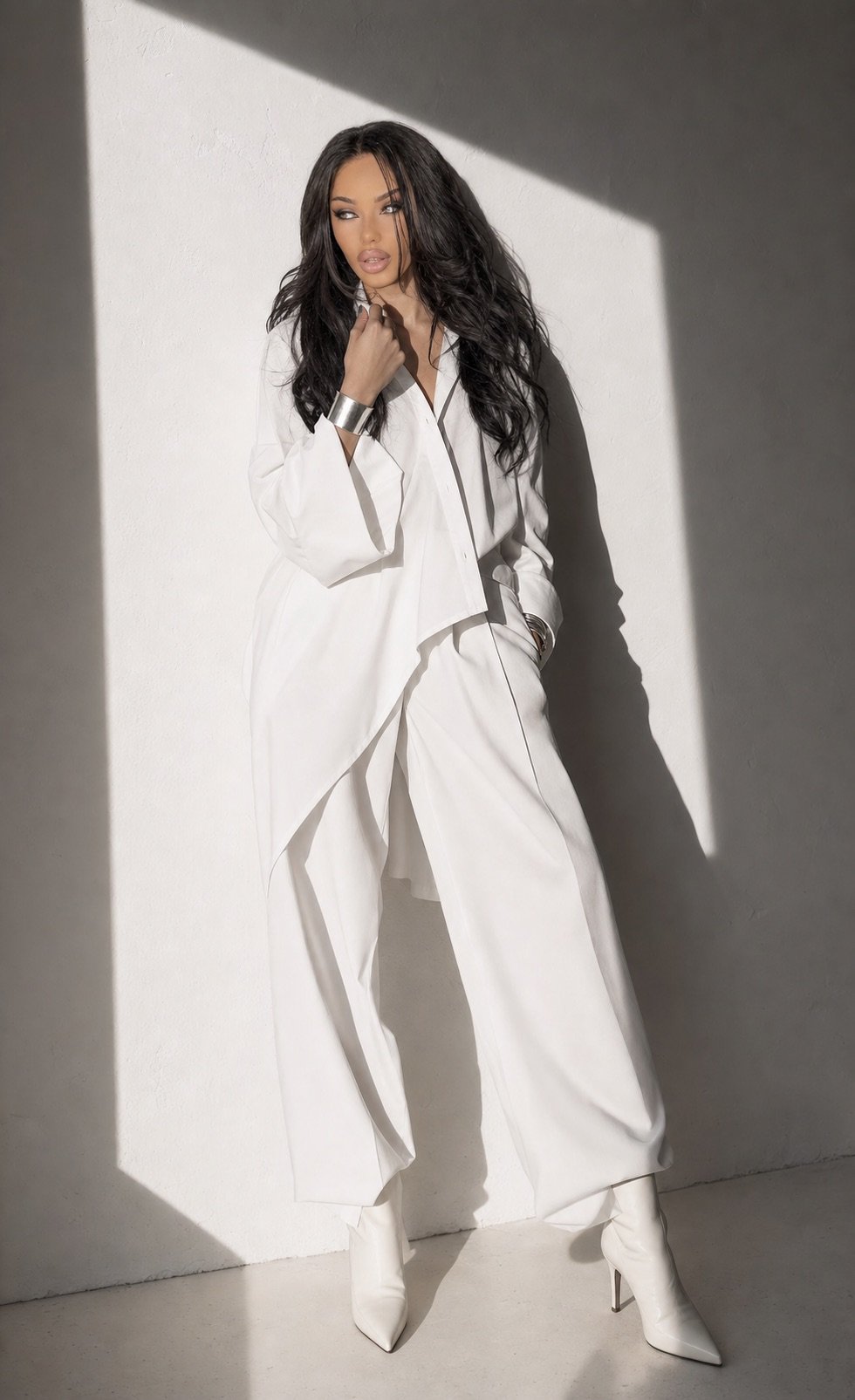 Lana Bajc in a white-shirt modernist fashion composition.